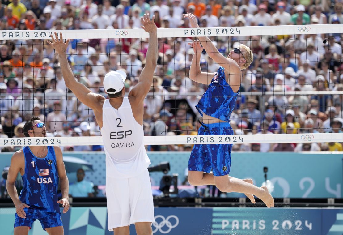 2 Aug 2024;  Paris, France;  Chase Budinger (USA) spikes against Adrian Gavira Collado (ESP) during the Paris 2024 Summer Olympics at the Eiffel Tower.  Mandatory Credit: Kyle Terada-USA TODAY Sports